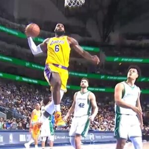 LeBron James just having fun doing dunk contest dunks after the whistle