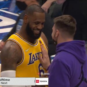 LBJ clearly pointing out that PURPLE hoodie when chatting with Luka Doncic 👀