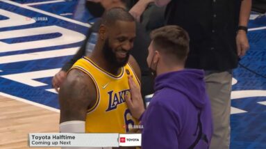 LBJ clearly pointing out that PURPLE hoodie when chatting with Luka Doncic 👀