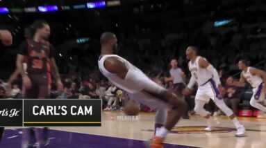 LeBron keeps himself from falling off balance